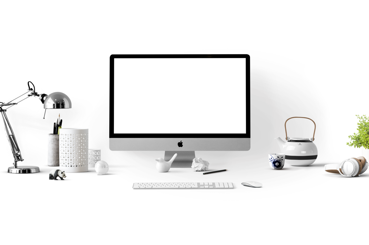 services-01 Minimalist office desk with an iMac, lamp, and stationary, perfect for tech backgrounds.